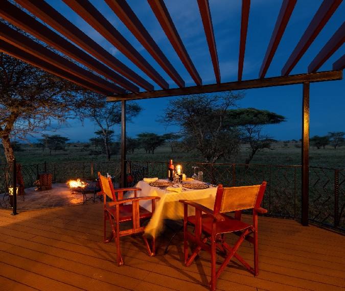 Dining set for two outside their room - Karibu camps