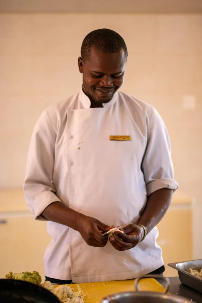 Chef preparing meals in the Lion's paw kitchen